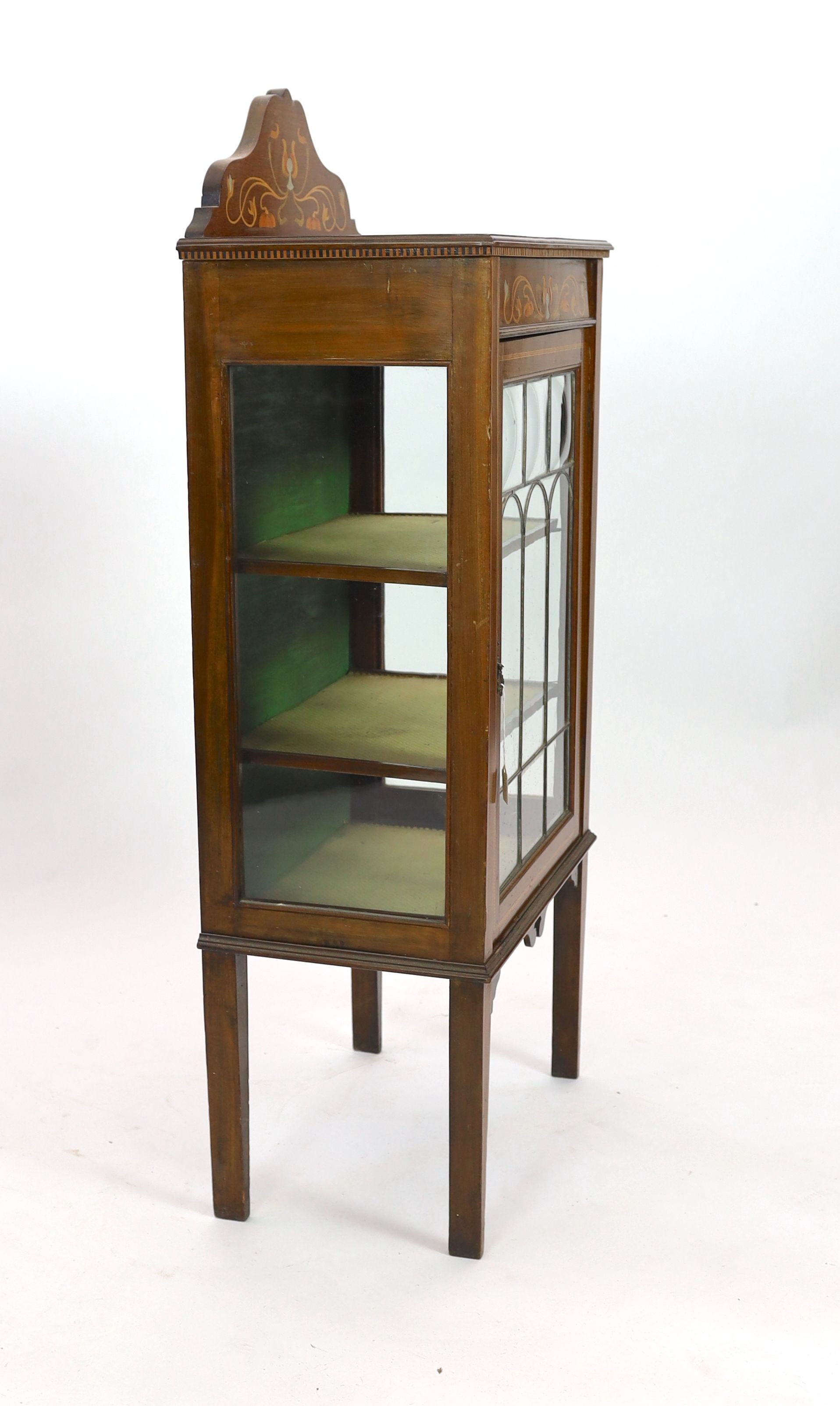 An Edwardian Art Nouveau inlaid mahogany display cabinet, with leaded glazed door, width 56cm depth 35cm height 132cm